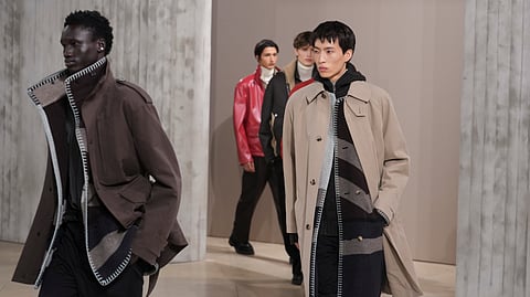 Models wear creations for the men's Hermes Fall-Winter 2025-2026 collection, that was presented in Paris