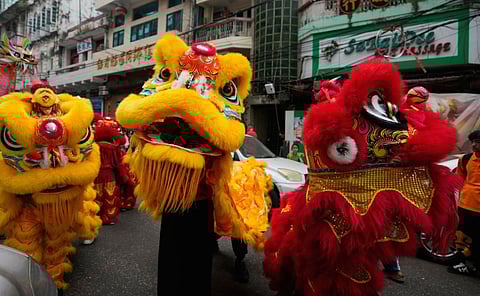 Lunar New Year festivals and prayers marked the start of the Year of the Snake around Asia and farther afield.