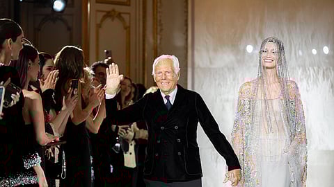 Giorgio Armani accepts applause at the end of the Giorgio Armani Prive Haute Couture Spring Summer 2025 collection, that was presented in Paris,