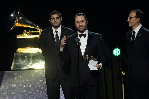 Kabir Sehgal, left, and Jason Carter accepts the award for best audiobook, narration, and storytelling recording for 'Last Sundays in Plains: A Centennial Celebration' during the 67th annual Grammy Awards on Sunday, Feb. 2, 2025, in Los Angeles