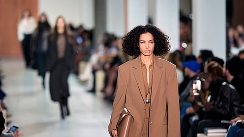 Models walk the runway during the Michael Kors Fall/Winter 2025 fashion show