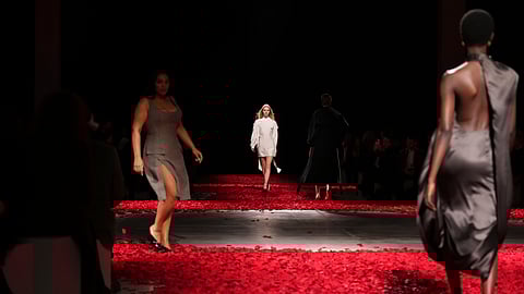 Models wear creations as part of the Ferragamo's Fall/Winter 2025-2026 collection presented in Milan, Italy,