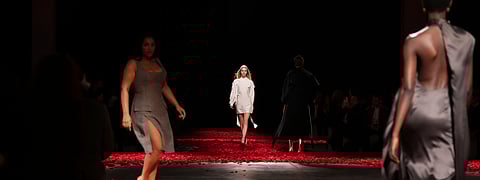 Models wear creations as part of the Ferragamo's Fall/Winter 2025-2026 collection presented in Milan, Italy,