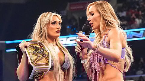 Tiffany Stratton (left) and Charlotte Flair during a SmackDown match. Source: X