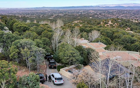 Santa Fe County deputies remain outside the house belonging to actor Gene Hackman and his wife Betsy Arakawa were earlier found dead, Thursday, Feb. 27, 2025 in Santa Fe, New Mexico
