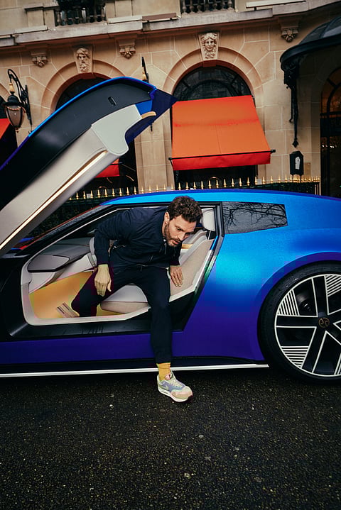 Jamie Dornan exits the Jaguar Type 00