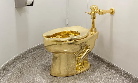 Jury convicts thief who stole golden toilet from English palace