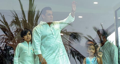 Salman Khan waves at fans with his niece and nephew