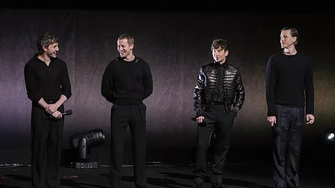 Paul Mescal, from left, Joseph Quinn, Barry Keoghan, and Harris Dickinson, cast members of the upcoming films about The Beatles, speak during the Sony Pictures presentation at CinemaCon