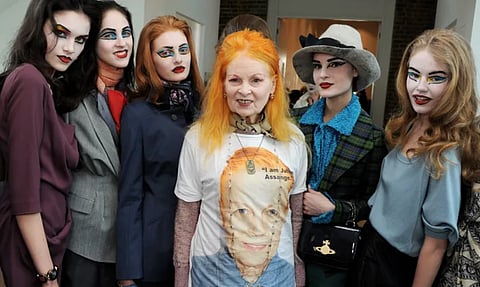 Vivienne Westwood poses with her models after a 2021 show