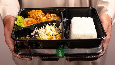 Why should you not accept, eat in, and store black plastic containers?