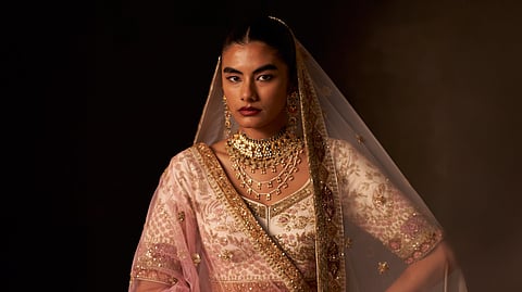 Taking a family legacy forward, ‘Virsa’ features bridal couture exuding divinity and grandeur