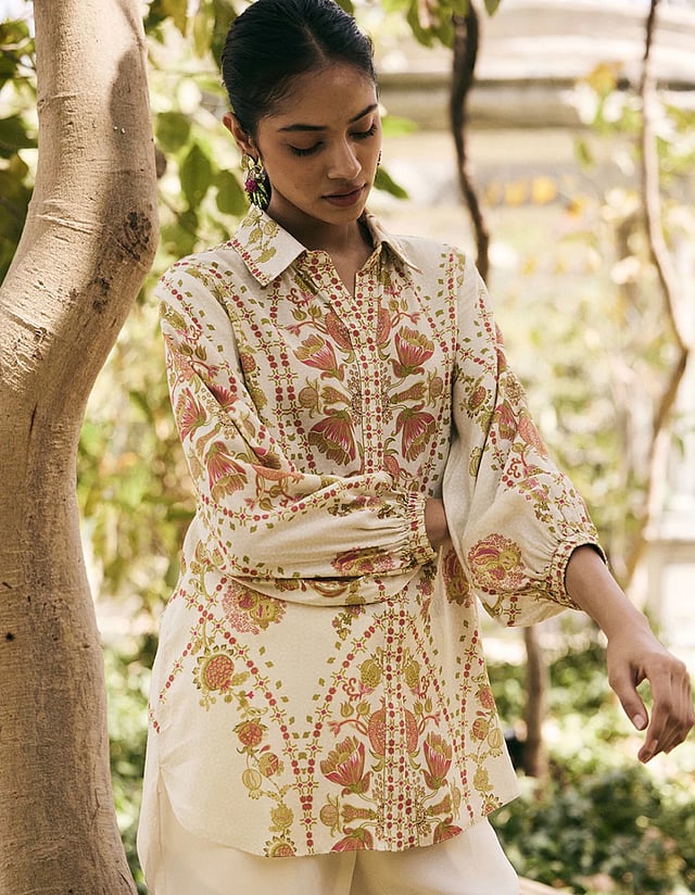 Lightweight Saundh Anar shirt with hand-painted pomegranate prints in soft pastel hues, styled with a relaxed fit and breathable fabric perfect for summer wear.