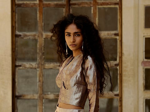Raya captures the essence of modern femininity which finds strength in softness