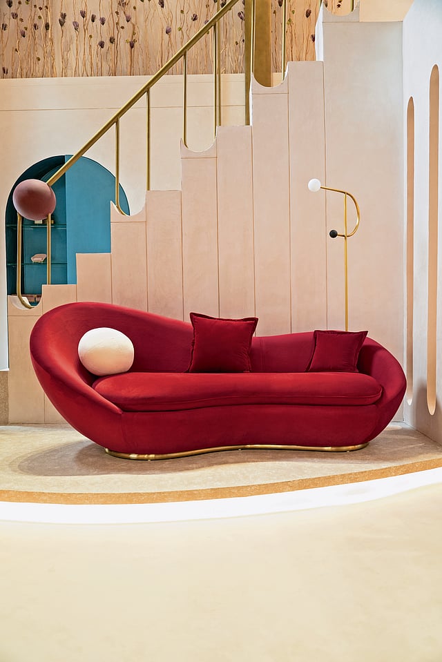 Statement furniture piece from the L’ILLUSTRE collection featuring grand proportions, rich textures, and a blend of brutalist and Art Deco elements