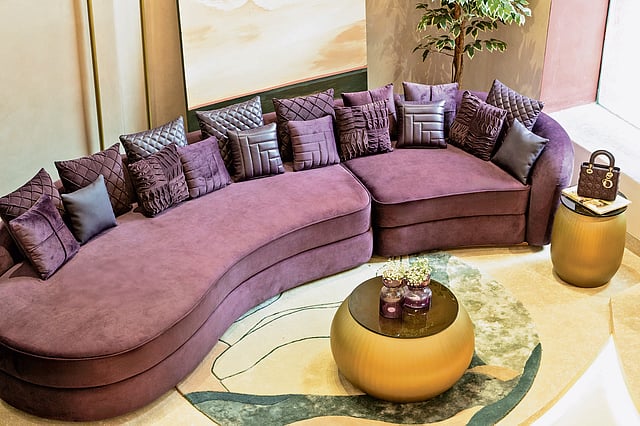Elegant furniture piece from the L’ILLUSTRE collection blending Art Deco rhythm with soft, sculptural detailing.