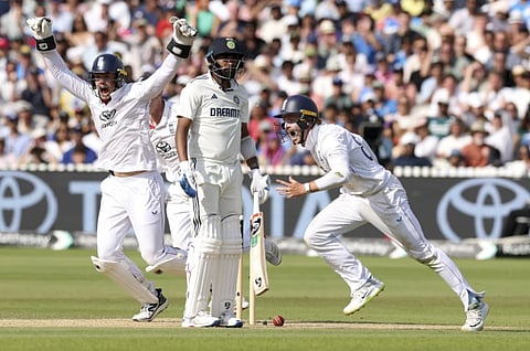 England’s players celebrate their win against India 