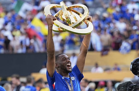 Chelsea defender Tosin Adarabioyo with the trophy