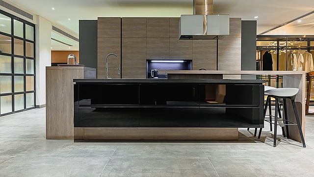 Cumin brown kitchen by 42mm Architecture with earthy tones, and seamless cabinetry 