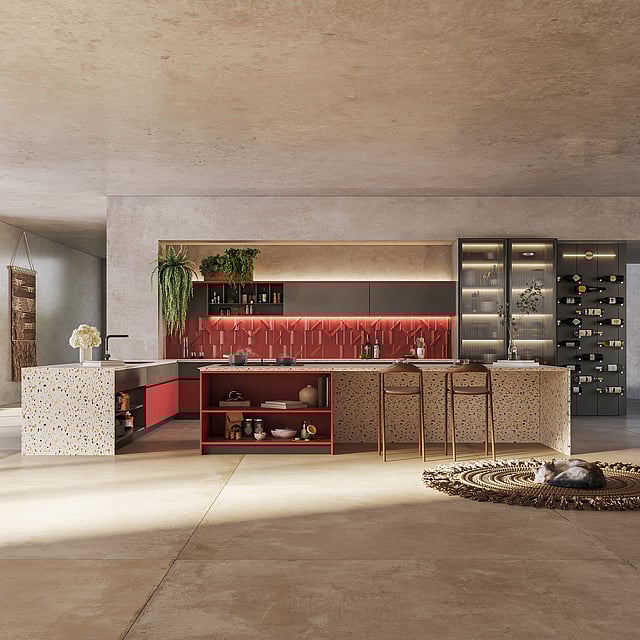 Bold red chilli-inspired kitchen design by Küche7 featuring fiery red cabinets, a patterned backsplash, and terrazzo island  
