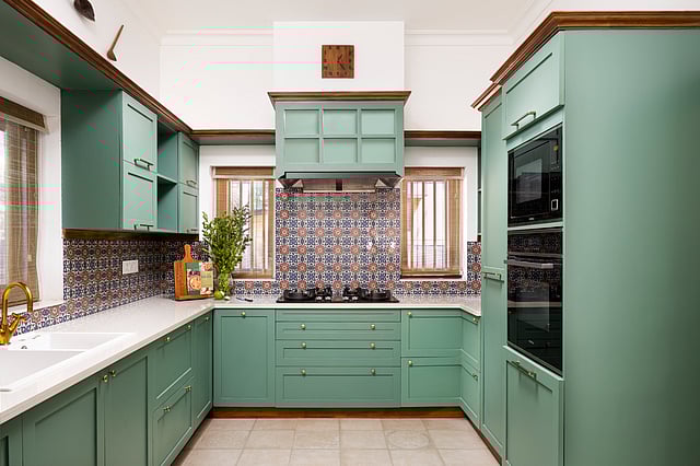 Elaichi-toned kitchen by Temple Town featuring soft pistachio green hues, sleek lines, and artisanal detailing