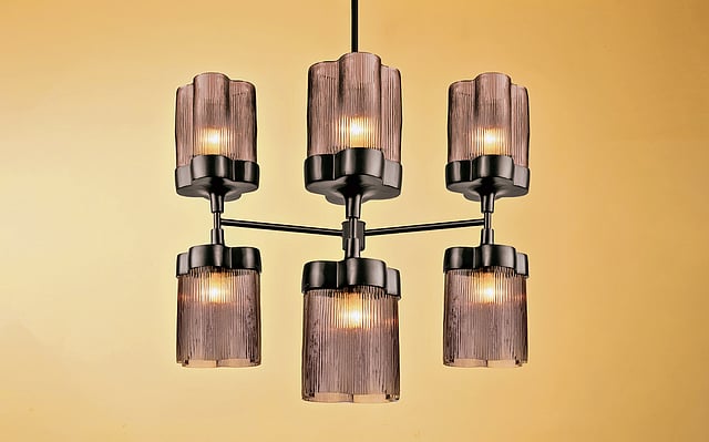 urrow Chandelier by Orange Tree featuring asymmetrical glass orbs and brushed metal branches, inspired by the moon’s textured surface and organic forms.