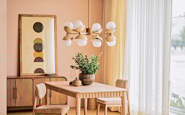 Asher Chandelier by Orange Tree featuring geometric design with star-like glass orbs and brushed metal finish, inspired by moonlight and celestial serenity.