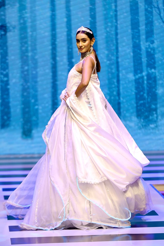 Model walking the runway at MCFW 2024