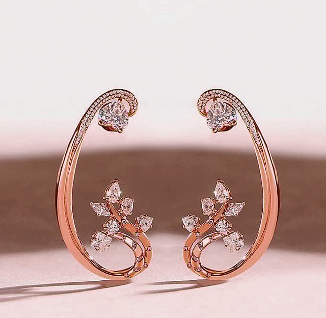 Gold earrings with vintage-inspired design from the Lana Del Rey jewellery collection