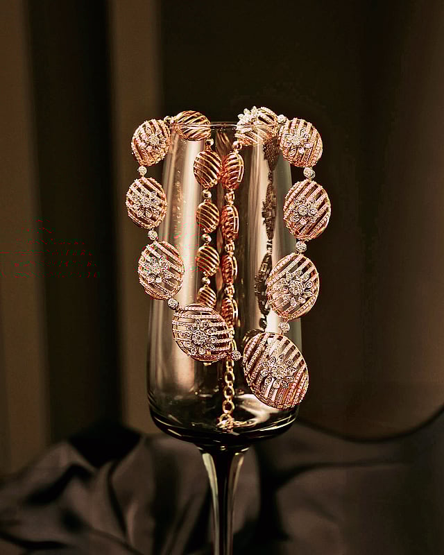 Detailed view of hand-finished gold jewellery 