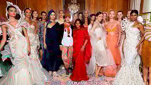 Vaishali S flanked by models at the recently concluded Paris Haute Couture Week