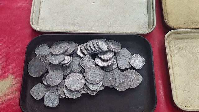 A stall in Dongri displaying old coins and vintage currency notes 