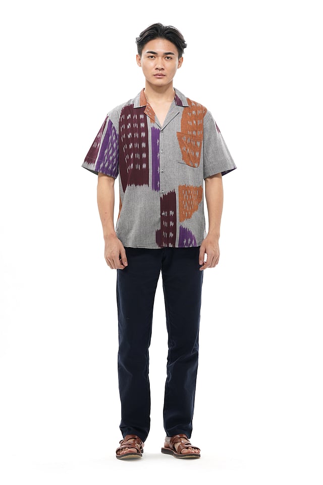 Model wearing Translate – Ikat India TOBU Men’s Resort Shirt in handwoven ikat cotton 