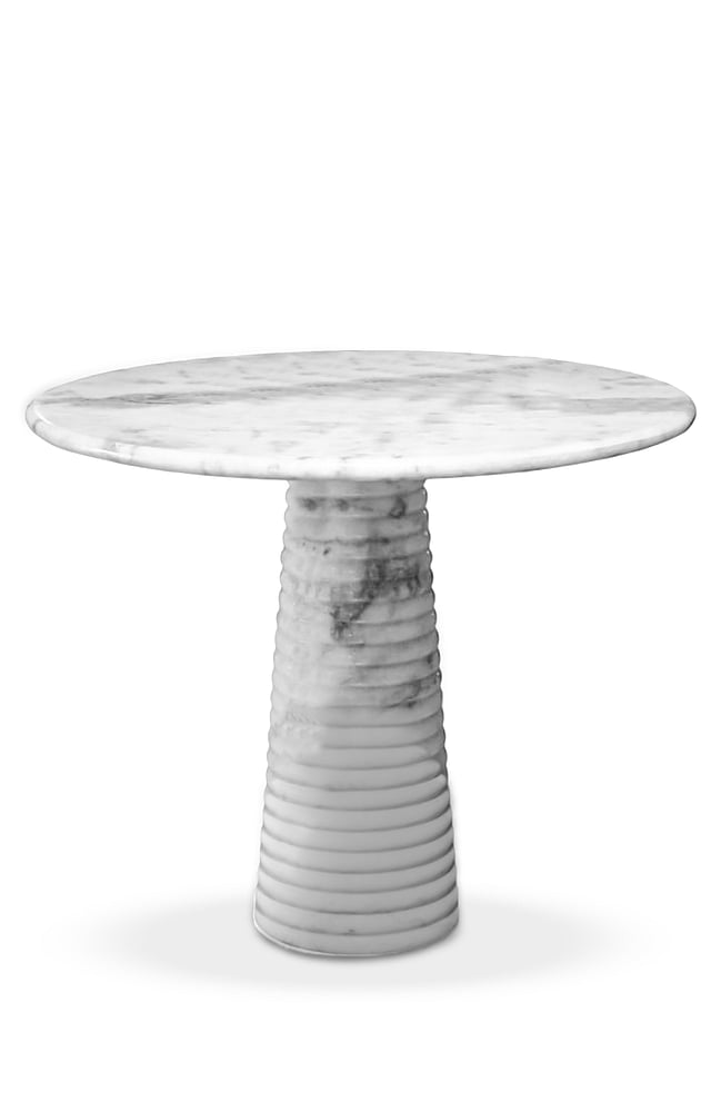 Handcrafted marble table by Avian that celebrate the natural beauty of stone