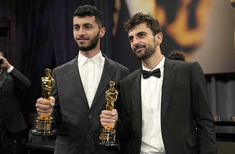 Oscar-winning Palestinian director Basel Adra says his home in West Bank raided by Israeli soldiers