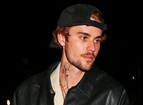 Justin Bieber playing golf in Scotland