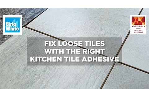 Can strong adhesive for tiles really prevent peeling near the kitchen sink?