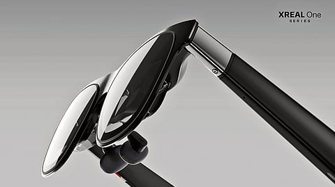 Hungary's Laszlo Krasznahorkai poses for photographers in London, Tuesday, May 19, 2015