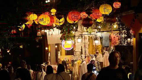 Hungary's Laszlo Krasznahorkai poses for photographers in London, Tuesday, May 19, 2015