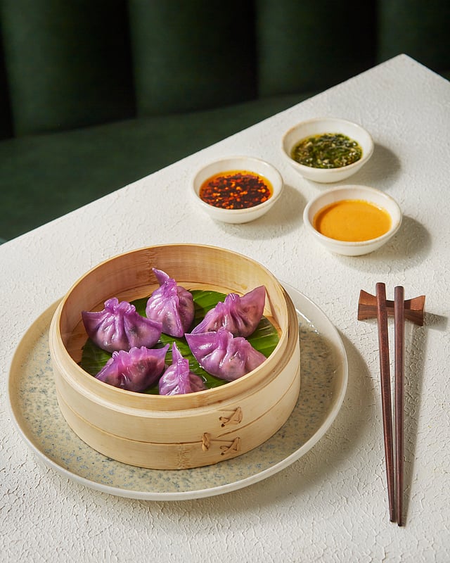 Upon entering, we were welcomed by a striking coffee bar and an irresistible dessert counter, baristas at work, and a parade of indulgent treats