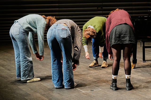 Yodelling students stretch with teacher Nadja Raess, 2nd right, at the Music High School in Lucerne, Switzerland