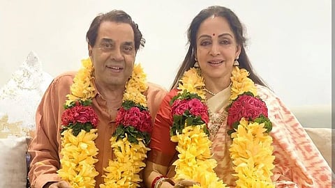 On the sets of Sholay Dharmendra paid some extra money to spot boys to impress Hema Malini