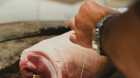 Adding cuts to meat and seafood before marinating