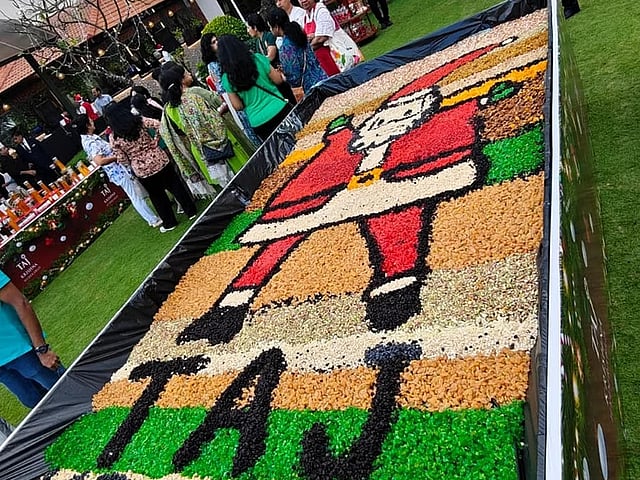 Cake mixing ceremony at Taj Krishna