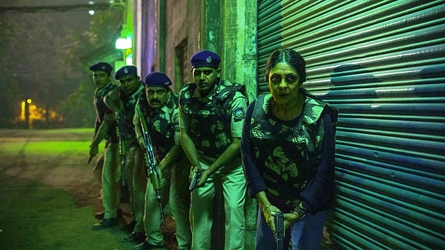 Shefali Shah with an ensemble cast in a still from Delhi Crime 3