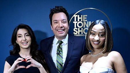 Nora Fatehi poses with Jimmy Fallon as she makes her debut on The Tonight Show