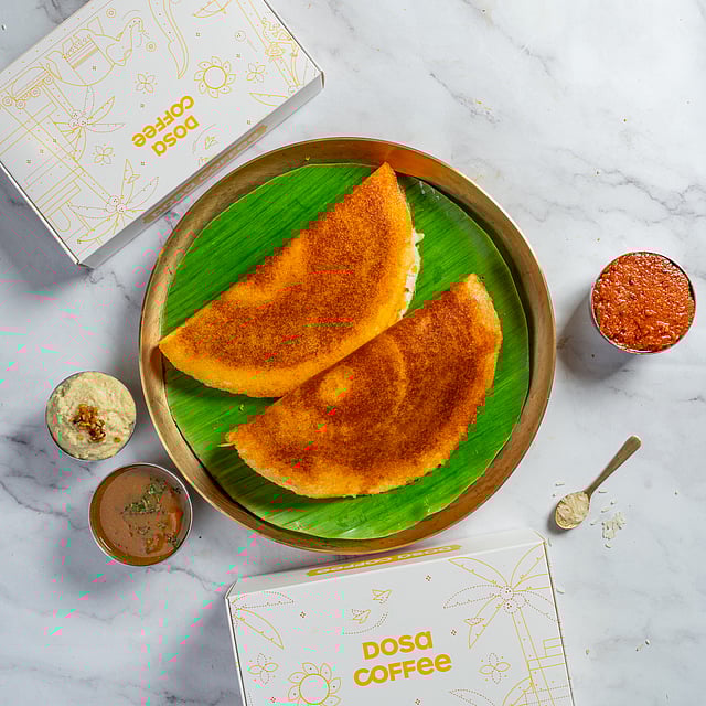 Tasting the tanginess of the raw mango benne dosa 