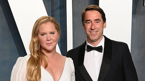 Amy Schumer and husband Chris Fischer