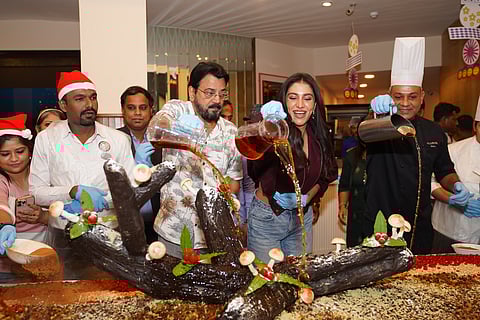 The celebrities indulge in cake mixing