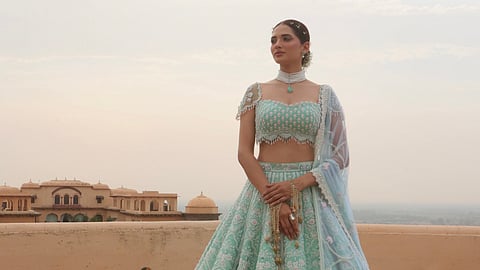 This bridal couture label’s latest collection is all about intricate threadwork in soft hues